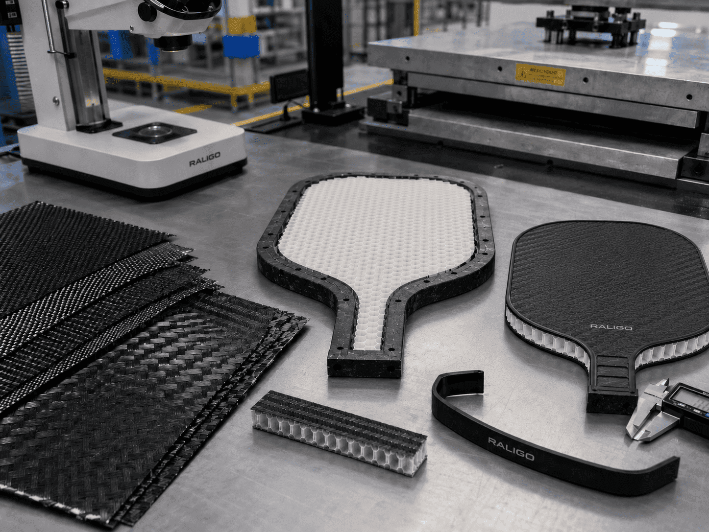 Carbon fiber prepreg layup, honeycomb core assembly, and thermoforming quality control for a pickleball paddle face