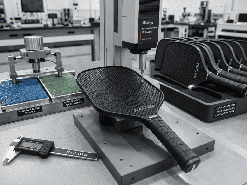 Carbon fiber pickleball paddle surface texture testing for Illinois indoor and outdoor court durability