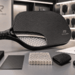 Carbon fiber pickleball paddle with core and damping layer samples for cushioning and shock absorption product development